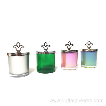 Colored glass candle jar with flame shape knob lid